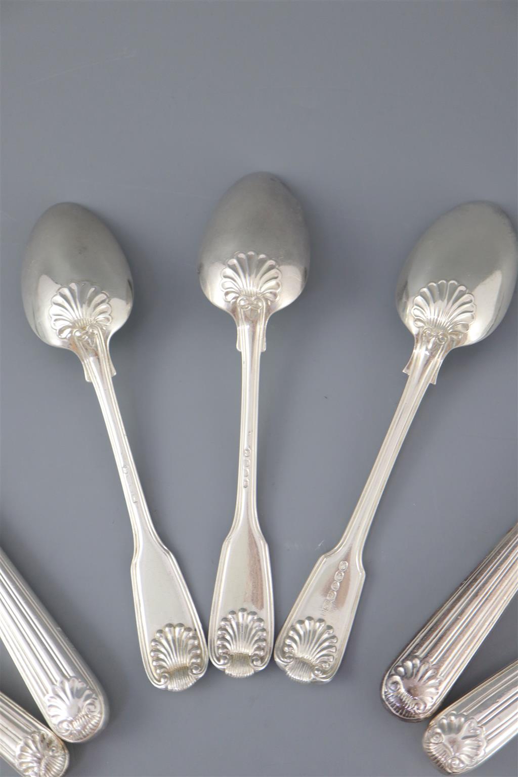 A matched part canteen of George III and later silver fiddle thread and shell pattern cutlery, weighable silver 139.5oz.